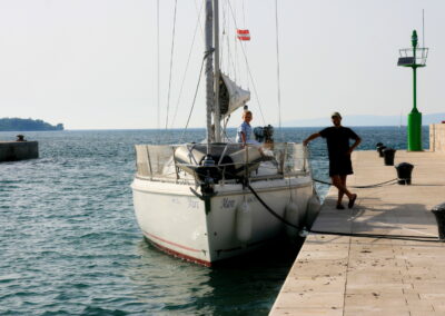 A Man And A Boy On A Boat